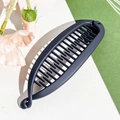 Detail view of the matte dark blue banana hair clip with interlocking comb teeth design - Plastic/Resin / 11.5cm / Matte Navy Blue