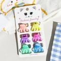 Dettaglio di 6 mini mollette per capelli colorate marmorizzate su una base decorativa - Piccolo / Stile Anguria Marmo
