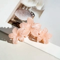 Pink marble plumeria hair claw clip with elegant pearlescent finish and floral design - Orange Pink