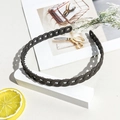 Detail view of coffee brown matte wave headband with anti-slip inner teeth and chain texture - Matte Chain Headband - Dark Brown