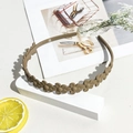 Detail of coffee brown daisy headband with matte texture and anti-slip inner teeth - Matte Floral Headband - Milk Coffee