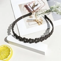 Detail of coffee brown matte wave headband with decorative petals and anti-slip teeth - Matte Hollow Flower Headband - Dark Coffee