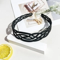 Close-up of black wave headband showing the woven hollow design and non-slip inner teeth - Matte Grid Headband - Black