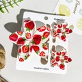 Dettaglio set di fermagli per capelli con stampa fragola su carta con foglie e limoni - Stile Motivo Fragola (UV印鸡蛋花3件套-ABS-24-1)