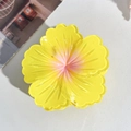 Macro shot of the translucent yellow flower hair claw clip with pink gradient center - 7.5cm Hibiscus Claw Clip - Gradient Yellow