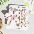 Three-piece floral hair clip set with UV printed red dots and ribbons on white resin - Red Ribbon Polka Dot Style (UV Printed Frangipani 3-Piece Set - ABS - 99-3)