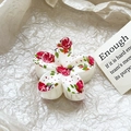 Macro detail of frangipani hair claw with red pomegranate print and sturdy teeth - Pomegranate Floral Style (24-5)