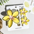 Detailed close-up of yellow floral hair clip set with lemon themed summer decorations - Yellow Petals with White Hand-Painted Texture (UV Printed Frangipani 3-Piece Set - ABS - 110-B2)