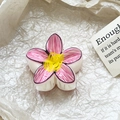 Detailed view of a resin plumeria hair claw with pink petals and yellow center - Pink Purple Texture Hand-drawn Style (110-B1)