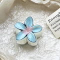 Detail of blue frangipani hair claw clip showing realistic petal texture and design - Sky Blue Pink Gradient Style (110-B3)