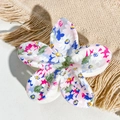Macro shot of floral plumeria hair claw clip with colorful UV printed patterns - Pink Blue Full Cover Floral Style / ABS