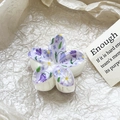 Close-up of frangipani hair claw clip with purple floral print on matte white surface - Purple Bellflower Style (116-4)