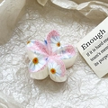 Detail view of tropical plumeria hair claw clip with floral patterns on beige paper - Blue Pink Branch Leaf Style (116-6)