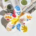Detailed view of flower hair claw with colorful hand-painted patterns on glossy cream base - ABS / White Base Abstract Hand Drawn-ABS Beige 154-5