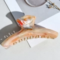 Detail of large acetate hair claw clip with beige marble texture and coral orange accents - PS / 11.5cm Straight / Multi Orange