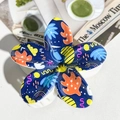 Detailed view of dark blue plumeria hair claw with colorful pop art graffiti patterns - ABS / Deep Blue Pop Graffiti-ABS Beige 154-2