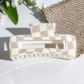 Close-up of square checkered claw clip in beige and lilac colors for hair styling - Creamy Yellow and Light Purple Checkerboard Style (152-1)