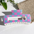 Detail of a rectangular hair claw clip with pink and blue checkerboard pattern - Pink and Blue Checkerboard Style (151-4)