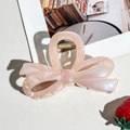 Detail of large pink ribbon hair claw clip showing a strong gold metal spring and smooth finish - Pink Small Bow Style