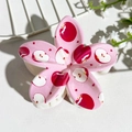 Detail of pink flower hair claw with apple print and white shark clip teeth - Apple Print (147-2)