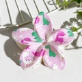 Detailed view of flower hair claw with cartoon dinosaur prints and matte purple finish - Pink Purple Dinosaur Print (139-2)
