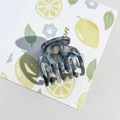 Macro view of the grey marble pattern and polished texture on the small hair claw clip - PS / 4cm 7-Tooth-Gray Black