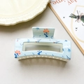 Detail of light blue floral claw clip with orange flowers on a minimalist background - Light Blue Floral Square Style (001-18)