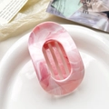 Pink and white marble resin hair claw clip with curved oval cutout on a stylish background - 10cm Round Clip - Marble Pink
