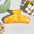 Detailed view of large marble texture hair claw clip on a stylish decorative surface - Square Head Style (M-13)