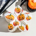 Close-up of checkered flower hair claw with orange Halloween pumpkin prints - 8cm Uv-printed Frangipani - Abs Beige 02-2 / ABS