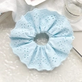 Detail of light blue lace embroidery scrunchie with hollow floral patterns and wavy edges - 17cm Large / Sky Blue