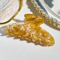 Detailed close-up of marble acetate hair claw clip with colorful iridescent glow - 9cm Square Head Style / Rainbow Gold