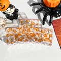 Detail of transparent Halloween hair claw clip with orange pumpkin and ghost print - Solid Square - Golden Pumpkin