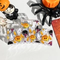 Detail showing Halloween pumpkin and ghost print on a transparent square hair claw clip - Solid Square - Purple Hat Coal Ball