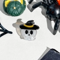 Macro detail of a mini Halloween acrylic hair clip featuring a skull with a black wizard hat - Ghost With Hat