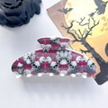 Detail view of large Halloween hair claw clip with skull and red rose gothic pattern - 10.5cm Printed Square Head Black Skull Red Rose (005-03)