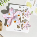 Chic UV-printed floral hair claw set with daisy patterns on white display card - Pink Foliage White Daisy Style (UV Printed Frangipani 3-Piece Set, ABS)