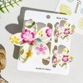 Floral print hair clip set with pink and yellow summer flower patterns on white base - Multicolor Pastoral Floral Style (UV Printed Plumeria 3-Piece Set - ABS-118-3)