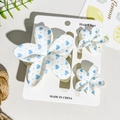 Three-piece flower hair clip set with white and blue heart patterns for vacation - White Background Blue Heart Dot Style (UV Printed Frangipani 3-Piece Set - ABS - 126-1)