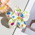 Close-up of floral square hair claw clip with colorful UV printed flower patterns - Beige Floral (8cm)