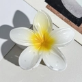 Detailed view of plumeria hair claw clip with yellow gradient resin petals and firm grip - 8cm White Yellow Plumeria Claw