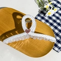 Detail of checkered hair claw clip with heart decoration on a wooden tray - Cross Sprinkled Heart (12.5cm)