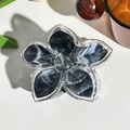 Macro shot of flower-shaped hair clip with black and white marble ink texture and silver glitter - Black Coffee (M-07)
