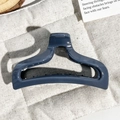 Detail of dark grey-blue PC fishtail hair claw with strong grip on beige linen background - Blue Gray