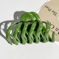 Close-up of a large glossy green pumpkin hair claw clip with strong metal spring - Grass Green
