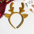 Détail d'un serre-tête en peluche de bois de renne marron avec carte de vœux de Noël - Bois de renne jaunes