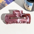 Detailed view of dark burgundy marble hair claw clip with glossy resin texture - PC / Reddish Purple