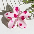 Pink plumeria hair claw clip with red heart patterns and polished finish detail - Light Pink Heart Print (141-8)