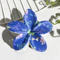 Blue plumeria hair claw clip with colorful bow prints and white resin grip teeth - Blue Bow Print (142-1)