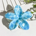 Blue plumeria hair claw clip with ocean patterns like starfish and seashells - Light Blue Ocean Print (144-4)